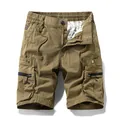 Men's khaki casual cargo shorts with multi-pockets and drawstring waist design - 28 / Bottoms / Camel