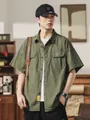 Men's olive green short-sleeved utility shirt featuring a casual multi-pocket design - M / Tops / Army Green