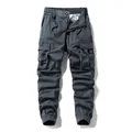 Charcoal grey high-street cargo joggers with multi-pocket design and elastic cuffs. - 29 / Bottoms / Gray