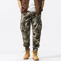 Durable men's loose camouflage cargo jogger pants with side pockets and elastic cuffs - 38 / Bottoms / Khaki