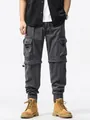 Vintage grijze heren cargo broek met meerdere zakken en een losse techwear pasvorm - 40 / Bottoms / Grijs