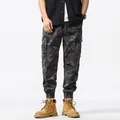 Men's dark camouflage cargo jogger pants with elastic cuffs and multiple pockets. - 38 / Bottoms / Gray