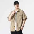 Classic khaki short-sleeved utility workwear shirt for men featuring double chest pockets - M / Tops / Khaki
