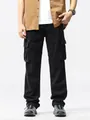 Men's black vintage cargo pants featuring multiple utility pockets and loose fit style - 29 / Bottoms / Black