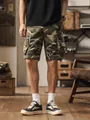 Men's stylish camouflage cargo shorts featuring relaxed fit and functional multi-pocket design - 30 / Bottoms / Khaki Camo