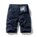 Men's navy blue casual cargo shorts with multi-pocket design and drawstring waist. - 30 / Bottoms / Dark Blue