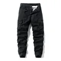 Versatili pantaloni cargo neri da uomo con vestibilità ampia, coulisse e tasche multiple - 28 / Parte Inferiore (552) / Nero