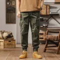 Vintage green techwear cargo pants with multi-pocket and cuffed hem - 28 / Bottoms / Army Green