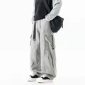 Men's loose straight-leg multi-pocket cargo pants in versatile light gray finish. - S / Bottoms / Gray