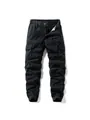 Men's black multi-pocket cargo pants with elastic drawstring waist and cuffed hem. - 28 / Bottoms / Black