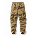 Men's vintage khaki cargo pants with multiple pockets and elastic cuffs for outdoor wear. - 28 / Bottoms / Camel