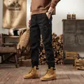 Men's black retro cargo joggers with multi-pocket design and cuffed ankles - 28 / Bottoms / Black