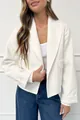 Elegant white short woolen coat with lapel collar and ribbed cuff details on model - S / Tops / White