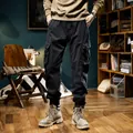 Men's black fleece-lined cargo jogger pants with multi-pockets and warm winter lining - 28 / Bottoms / Black Fleece Lined