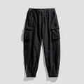 Professionelle schwarze Cargo-Hose für Herren mit Taschen und Reißverschlussbündchen - 28 / Unterteile / Schwarz Dick