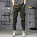 Herren Cargohose in Armygrün mit mehreren Taschen und schmal zulaufenden Bündchen - 28 / Unterteile / Armeegrün Dünner Stil