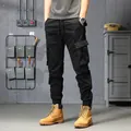 Herren Thermohose Cargo in Schwarz mit Fleecefutter und praktischen Mehrfachtaschen - 28 / Unterteile / Schwarz Dünner Stil