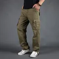 Men's olive green multi-pocket cargo pants with a loose fit for casual outdoor wear. - 29 / Bottoms / Army Green