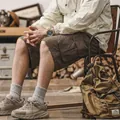 Stylish men's cotton cargo shorts in dark brown, outdoor lifestyle lifestyle photography - 29 / Bottoms / Coffee