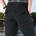 Schnelltrocknende Herren-Outdoor-Cargohose in Schwarz mit vielen Taschen, Rückansicht - M / Unterteile / Schwarz