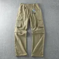 Convertible men's outdoor cargo pants with zip-off legs and multiple pockets. - M / Bottoms / Khaki