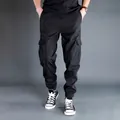 Pantaloni cargo jogger neri da uomo con tasche laterali e polsini elastici alla caviglia - 4XL / Pantaloni e gonne / Stile Primavera Autunno / Nero