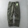 Vue détaillée du pantalon cargo tactique extérieur imperméable vert olive pour hommes - Vert Armée Polaire d'Hiver