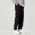 Men's dark camouflage cargo pants with multiple pockets and a comfortable relaxed fit - 3XL / Bottoms / Spring/Autumn Black Camouflage
