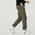 Men's army green fleece-lined cargo pants with multiple pockets for winter warmth - 3XL / Bottoms / Winter Fleece-Lined Army Green