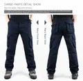 Detail view of navy blue cargo pants with six pockets shown from front and back angles. - 29 / Bottoms / Sapphire Blue