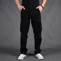 Classic black men's cargo pants featuring a multi-pocket design and straight leg loose fit - 29 / Bottoms / Black
