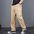 Men's durable khaki cargo pants featuring multiple utility pockets and tactical design. - M / Bottoms / Khaki