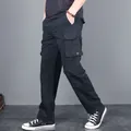 Classic men's black multi-pocket cargo pants with a loose tactical straight-leg fit - M / Bottoms / Black