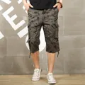 Men's stylish cotton cargo shorts featuring graffiti print and functional side pockets - 28 / Bottoms / Army Green