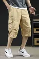 Loose fit khaki cargo shorts for men with multi-pockets and 3/4 length casual design - 4XL / Bottoms / Khaki