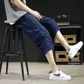 Loose fit navy blue men's cargo 3/4 length cropped pants with multiple utility pockets - Navy Blue