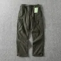 Full front view of olive green cargo pants showing pockets and belt assembly detail - S (90-105kg) / Bottoms / Fleece Lined / Army Green