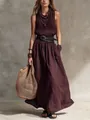 Detailed view of an elegant plum sleeveless maxi dress styled with boho accessories. - S / Top And Bottom / Dark Red