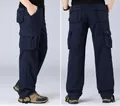 Casual loose navy blue men's cargo pants with multiple utility pockets straight fit - Navy Blue