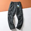 Quick-dry dark grey cargo pants for women with multiple pockets and detachable legs. - S / Bottoms / Dark Gray
