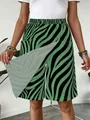 Detail view of green zebra print skirt-pants with elastic high waist and front layer - Green Stripes