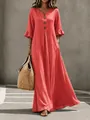 Primer plano de un elegante vestido largo rojo con cuello en V y detalles de volantes - Rojo