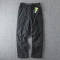 Black men's outdoor cargo pants with multiple utility pockets and adjustable belt buckle - S / Bottoms / Black