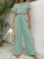 Elegante mintgroene tweedelige set met een cropped top en een wijde, soepele broek - Lichtblauw