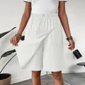 Stylish high-waisted white cotton-linen skort shorts for women with elastic waist and pockets - S / Bottoms / Ivory