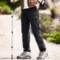 Schwarze schnelltrocknende Wanderhose für Herren, wasserabweisend und winddicht - S / Unterteile / Schwarz Mittelschwer
