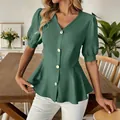 Detailed view of women's green V-neck puff sleeve peplum blouse with gold buttons - S / Tops / Green