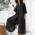 Detail view of a comfortable black linen-cotton shirt jumpsuit with buttons and wide-leg design - S / Top And Bottom (736) / Black