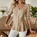 Detail view of a khaki V-neck puff sleeve peplum shirt with elegant linen-style texture - Khaki