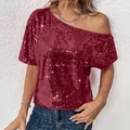 Close-up view of a plus-size red sequined off-shoulder top with short sleeves. - S / Tops / Fuschia